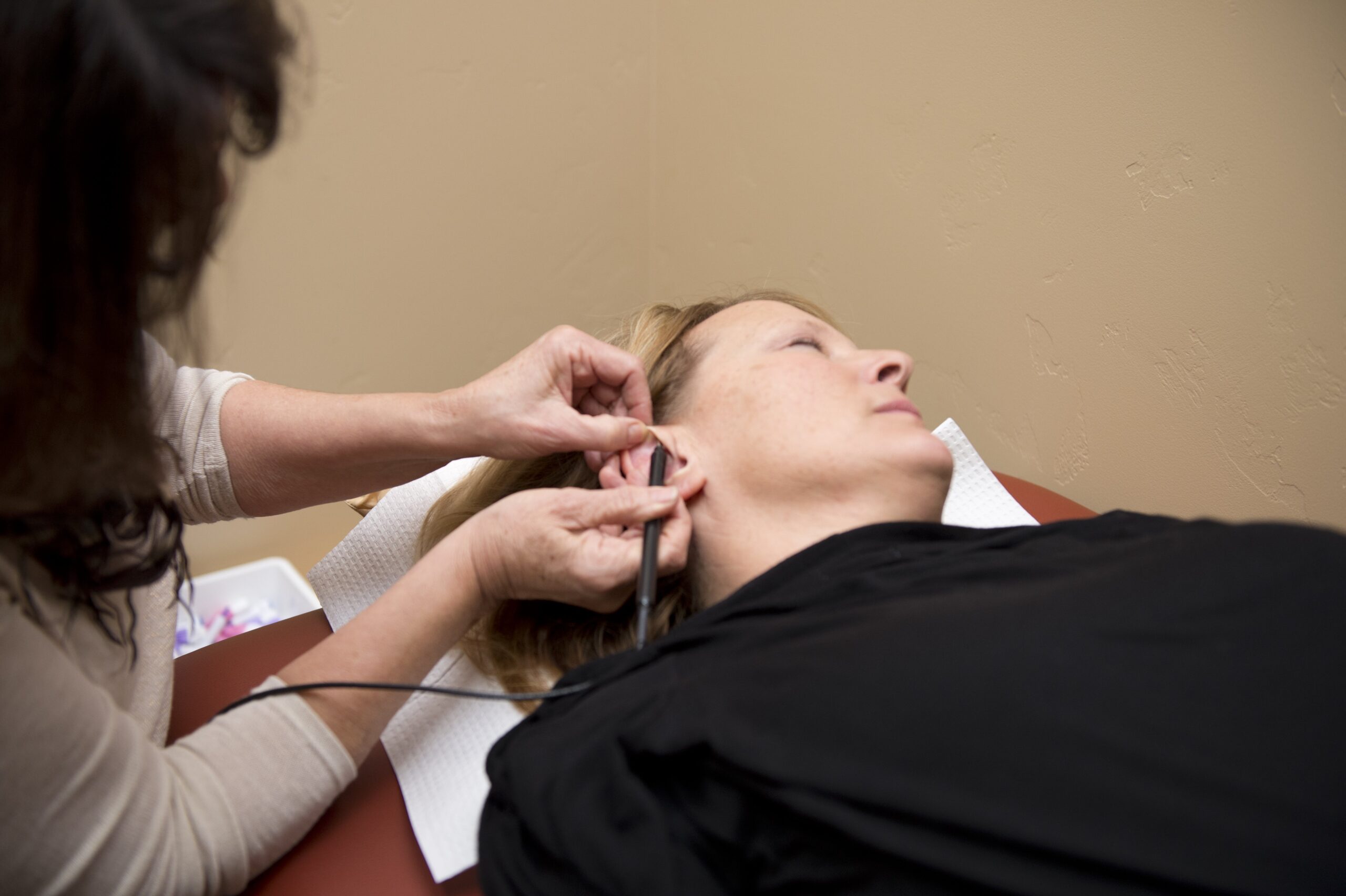 A patient undergoes auriculotherapy at the Karlfeldt Center of Idaho.