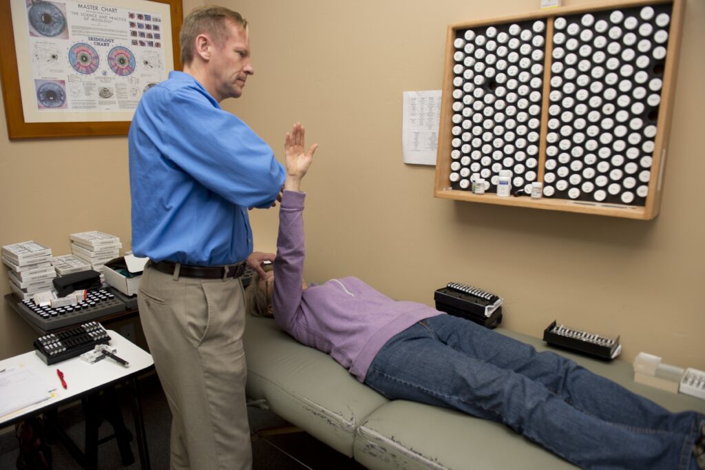 Image of a patient lying on her back and receiving treatment at the Karlfeldt Center of Meridian, Idaho.